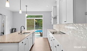 5220 Canyon River Dr NE, Ada, MI 49301