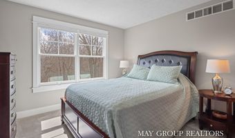 5254 Canyon River Dr NE, Ada, MI 49301