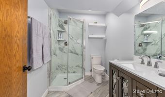 2264 Grand Valley Dr NE, Ada, MI 49301