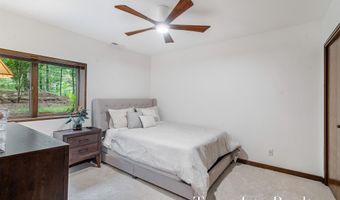 410 Greentree Ln NE, Ada, MI 49301