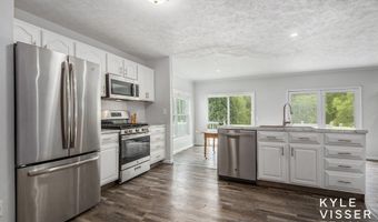 9020 5 Mile Rd NE, Ada, MI 49301