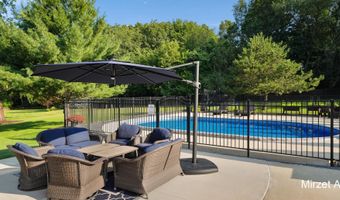 5220 Canyon River Dr NE, Ada, MI 49301