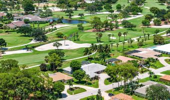 489 S Country Club Dr, Atlantis, FL 33462