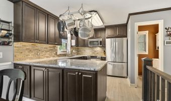 86 Carl Dr NE, Ada, MI 49301