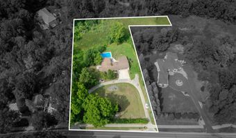5855 Grand River Dr NE, Ada, MI 49301