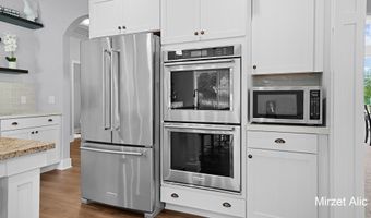 5220 Canyon River Dr NE, Ada, MI 49301