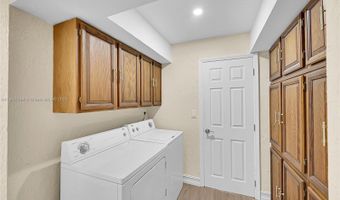 524 Muirfield Dr, Atlantis, FL 33462