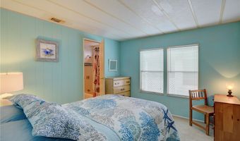 705 Hyacinth Cir, Barefoot Bay, FL 32976
