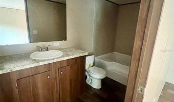 711 WHISPERING PINES Dr, Auburndale, FL 33823