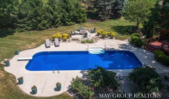 5254 Canyon River Dr NE, Ada, MI 49301