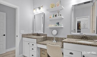 5220 Canyon River Dr NE, Ada, MI 49301