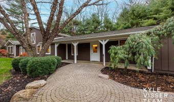 589 Grand River Dr NE, Ada, MI 49301