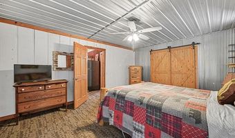 8074 Grosbeak Dr NW, Alden, MI 49612