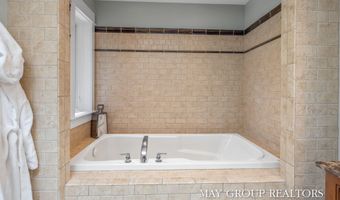 5254 Canyon River Dr NE, Ada, MI 49301