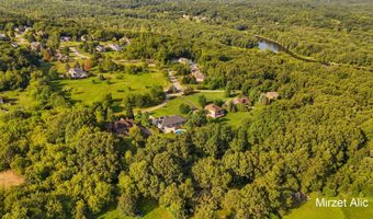 5220 Canyon River Dr NE, Ada, MI 49301