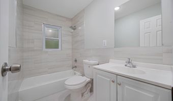 9 Holt St, Amityville, NY 11701