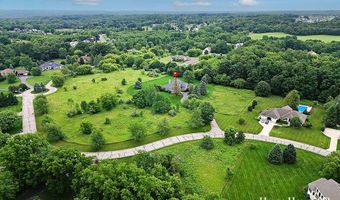 5327 Canyon River Dr NE, Ada, MI 49301