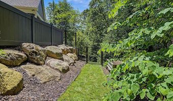 547 Roundtree Dr NE, Ada, MI 49301