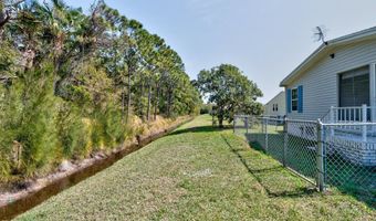 613 Papaya Cir, Barefoot Bay, FL 32976
