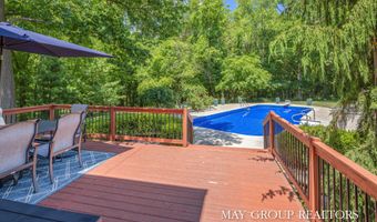5254 Canyon River Dr NE, Ada, MI 49301