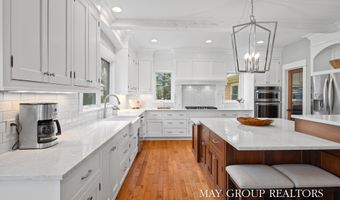 5254 Canyon River Dr NE, Ada, MI 49301