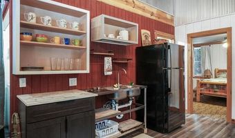 8074 Grosbeak Dr NW, Alden, MI 49612