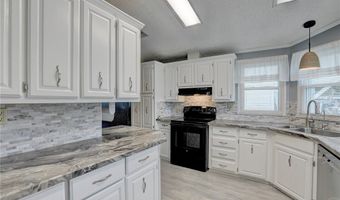 572 Dolphin Cir, Barefoot Bay, FL 32976