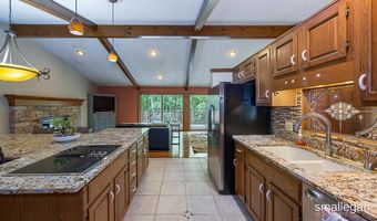 550 Greentree Ln NE, Ada, MI 49301