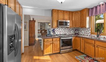 2264 Grand Valley Dr NE, Ada, MI 49301