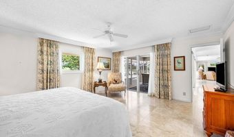 489 S Country Club Dr, Atlantis, FL 33462