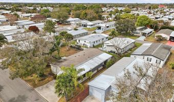 566 Dolphin Cir, Barefoot Bay, FL 32976