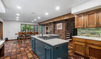 410 Greentree Ln NE, Ada, MI 49301