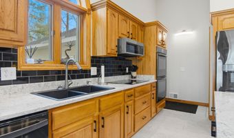 4473 Paper Birch Ln, Acme, MI 49686