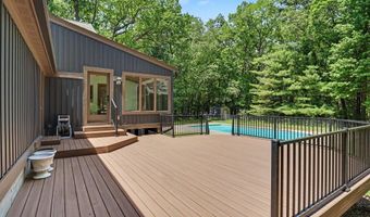 385 Greentree Ln NE, Ada, MI 49301