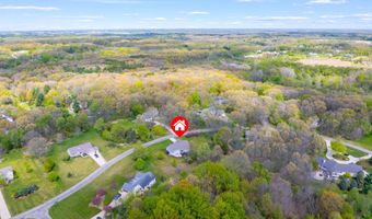 5730 Summerset Woods Dr, Alto, MI 49302
