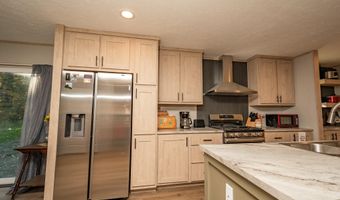 3 Back Rd, Abbot, ME 04406