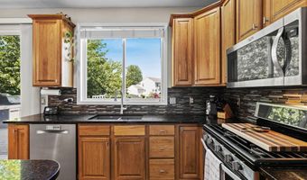 5616 Highbury Dr SE, Ada, MI 49301