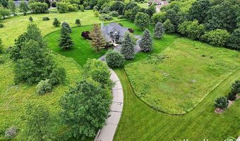 5335 Canyon River Dr NE, Ada, MI 49301