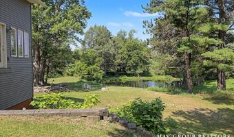 665 Honey Creek Ave NE, Ada, MI 49301