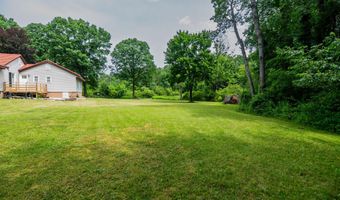 989 McCabe Ave NE, Ada, MI 49301