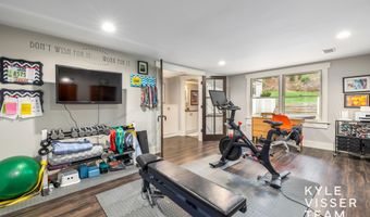 589 Grand River Dr NE, Ada, MI 49301