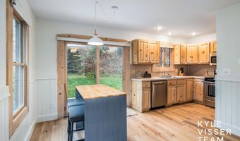 589 Grand River Dr NE, Ada, MI 49301
