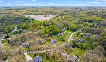 5730 Summerset Woods Dr, Alto, MI 49302