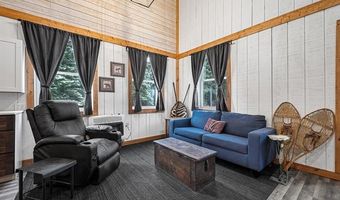 8074 Grosbeak Dr NW, Alden, MI 49612