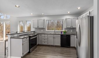 7721 Sun Quest Ridge Dr NE, Ada, MI 49301