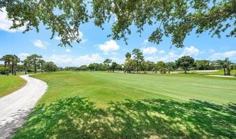489 S Country Club Dr, Atlantis, FL 33462