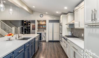 589 Grand River Dr NE, Ada, MI 49301