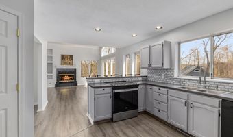 7721 Sun Quest Ridge Dr NE, Ada, MI 49301