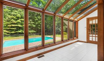 385 Greentree Ln NE, Ada, MI 49301