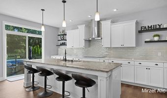 5220 Canyon River Dr NE, Ada, MI 49301